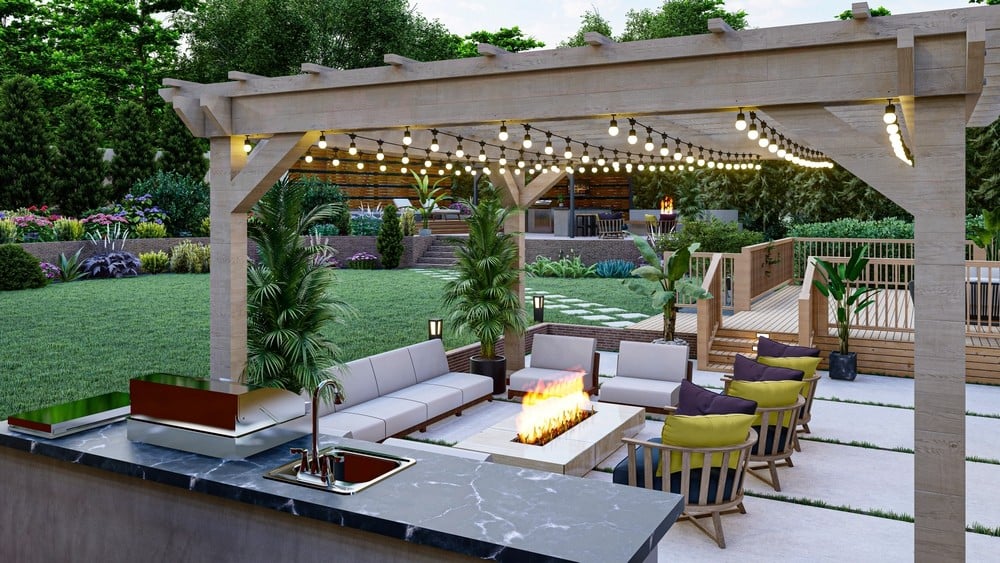 Stone outdoor kitchen with built-in grill on a Massachusetts patio