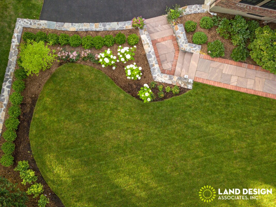 low-maintenance landscaping, luxury landscape design, hardscaping ideas, drought-tolerant garden, outdoor living, landscape lighting, xeriscape design