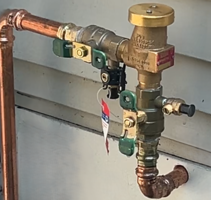Land Design Associates technician winterizing irrigation system in Walpole, MA